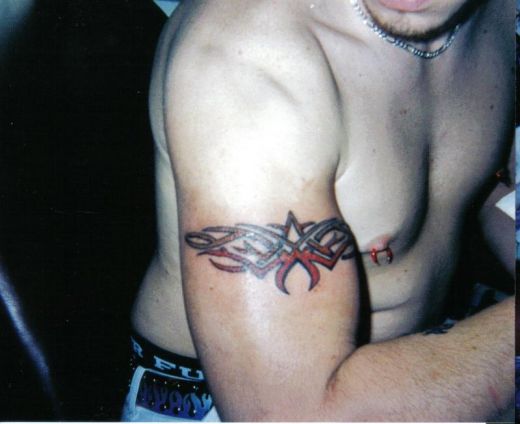 tattoo tribal arm. awesome tattoo tribal arm
