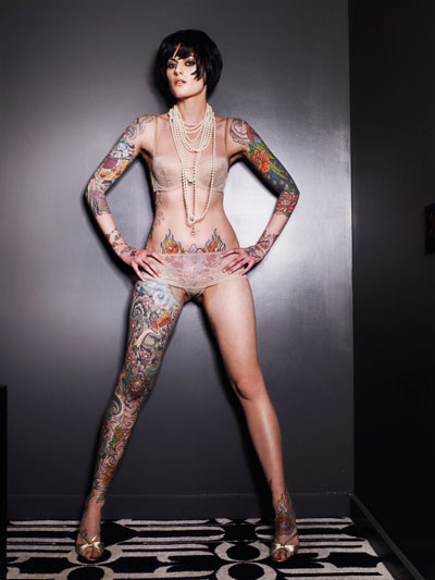 Girl Tattoo Artist Rihanna With Small Tattoo Pistol Design