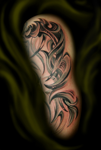 tribal arm tattoo of their preference. A man with very cool full sleeve