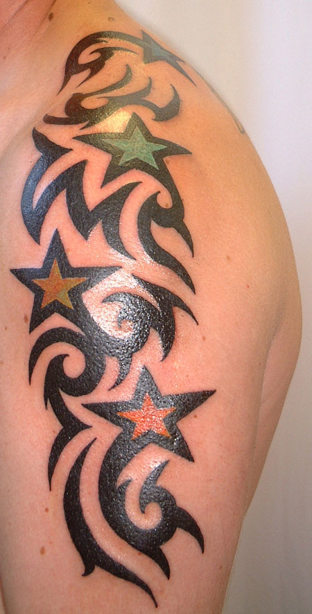 Tribal shoulder tattoos with their dark and bold patterns are becoming very 