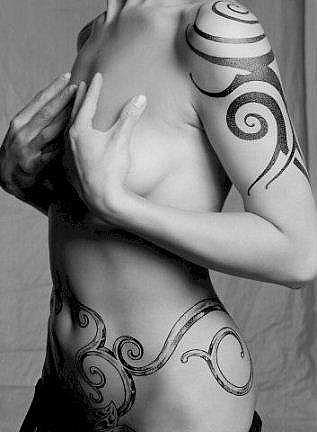 pictures of tattoos for women. side tattoos for women.